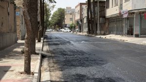 آسفالت خیابان قاضی‌زاده در مسیر نوسازی؛ عملیات رگلاژ آغاز شد، روکش آسفالت در راه است